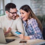 Photo of a Couple Who Just Booked an Affordable Stay. Travel on a Budget is Easier Than You Think!